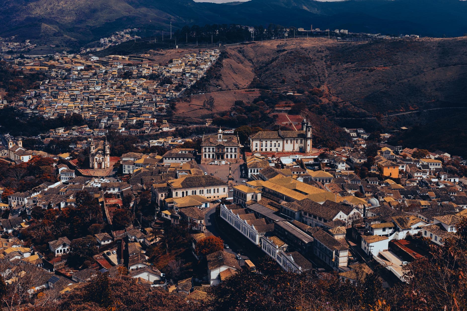 Stunning aerial view of Ouro Preto, Brazil, showcasing its historic architecture and mountainous landscape.