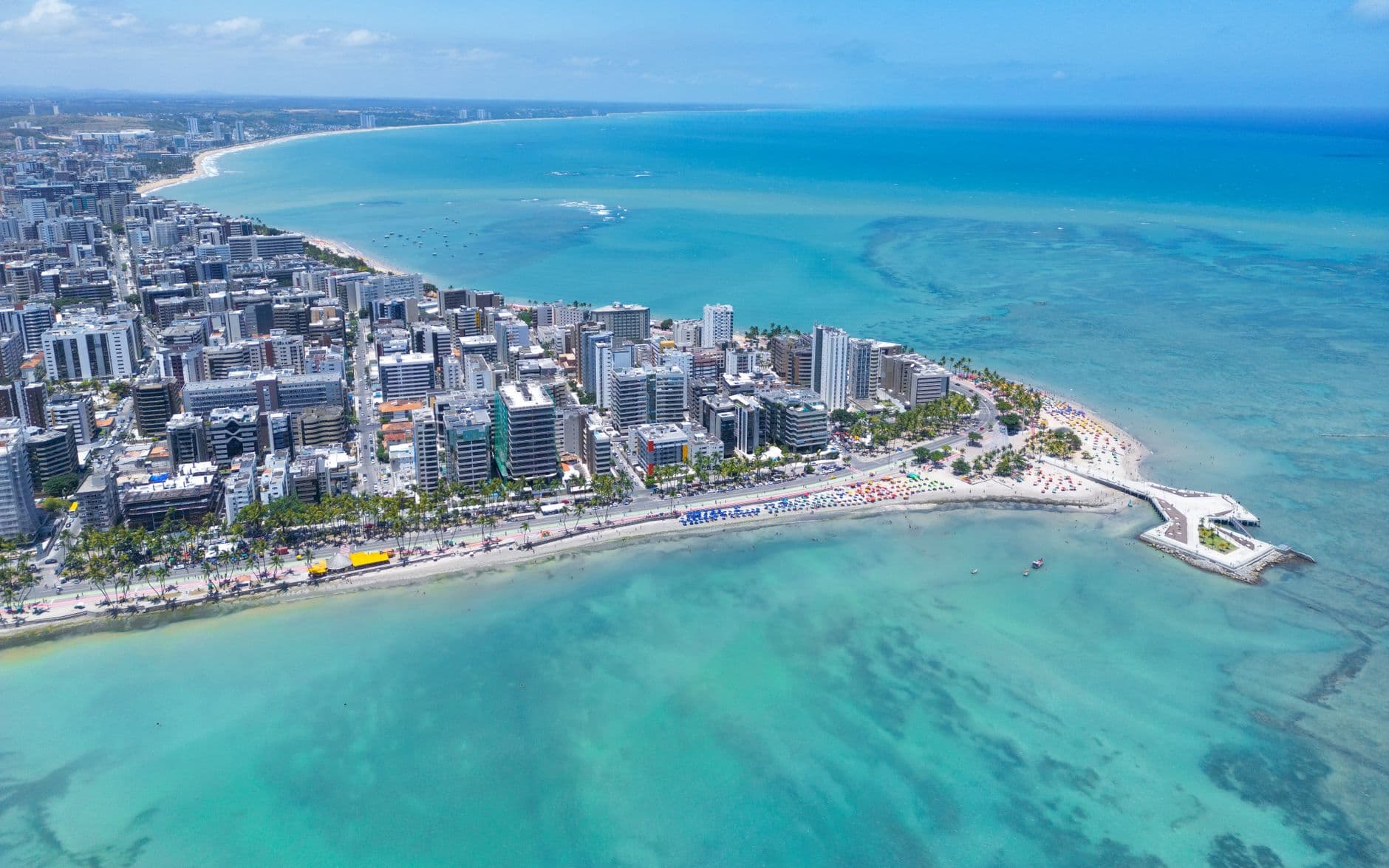 Explore the coastal beauty and urban landscape of Maceió, Brazil from above. Perfect for travel and urban themes.